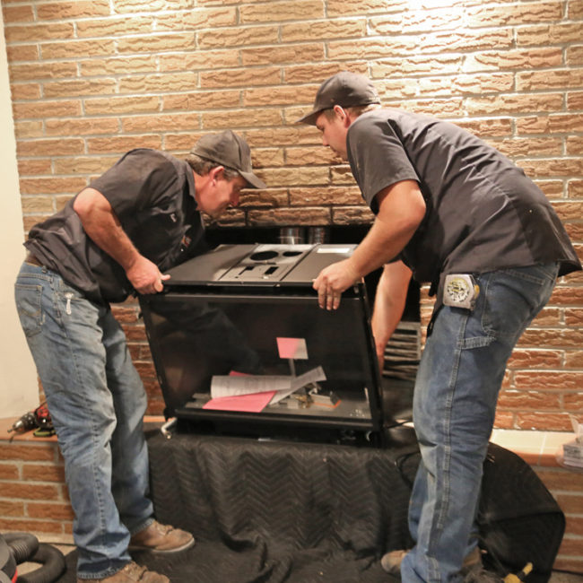 Platteville WI fireplace specialists installing fireplace insert